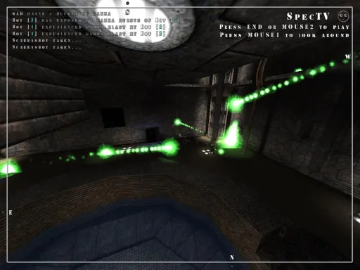 Iron Fist development screenshot of the Gamma Ray weapon, showing green energy projectiles streaking through a dark industrial arena during spectator view.